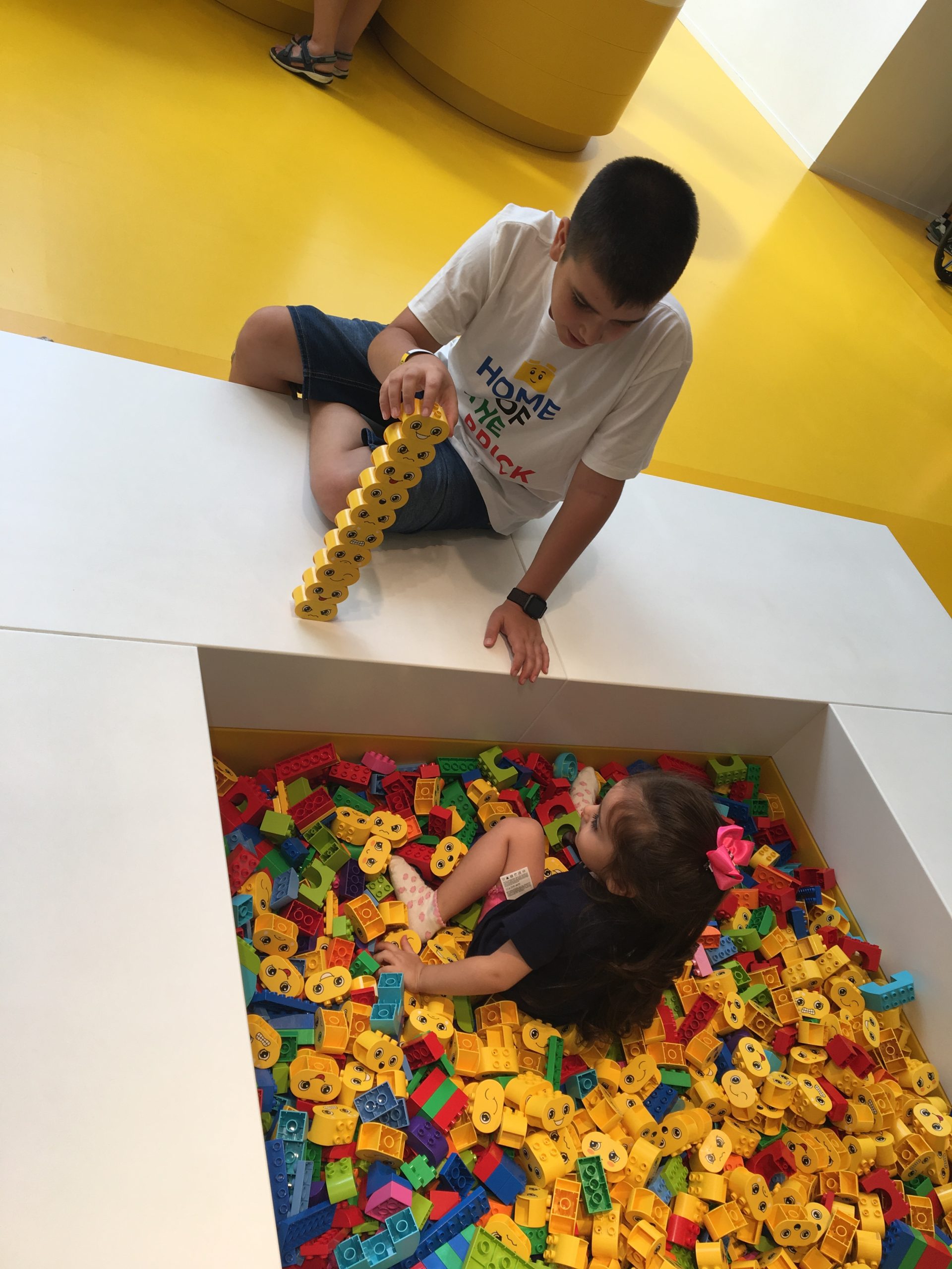 Playing with LEGO DUPLO emotion bricks with my sister at LEGO House